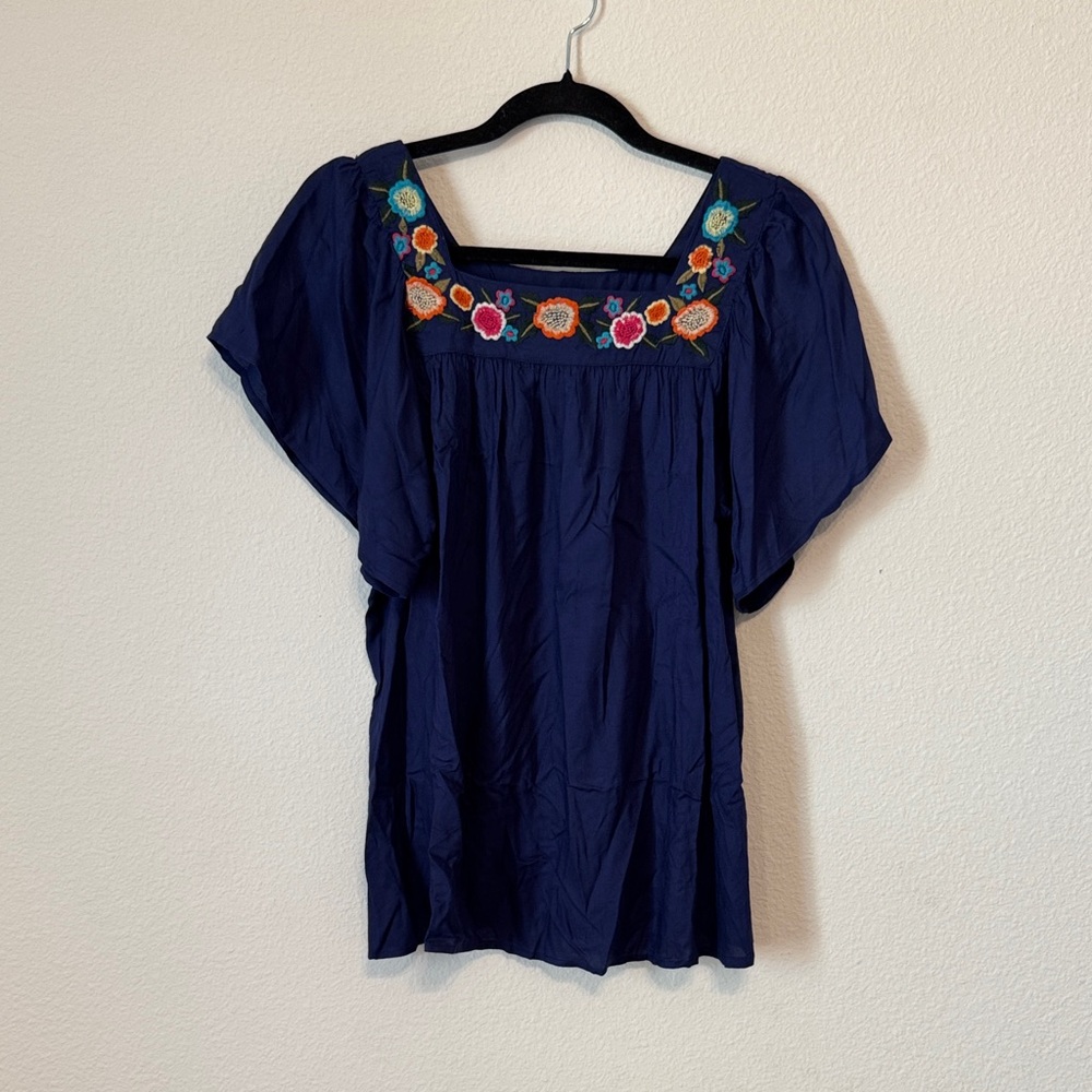 Angie Dark Blue Top with Vibrant Floral Design